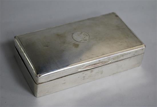 A 1920s silver rectangular cigarette box, 17.2cm.